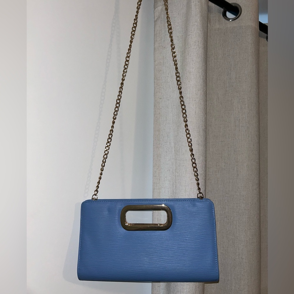 Blue handbad with golden chain